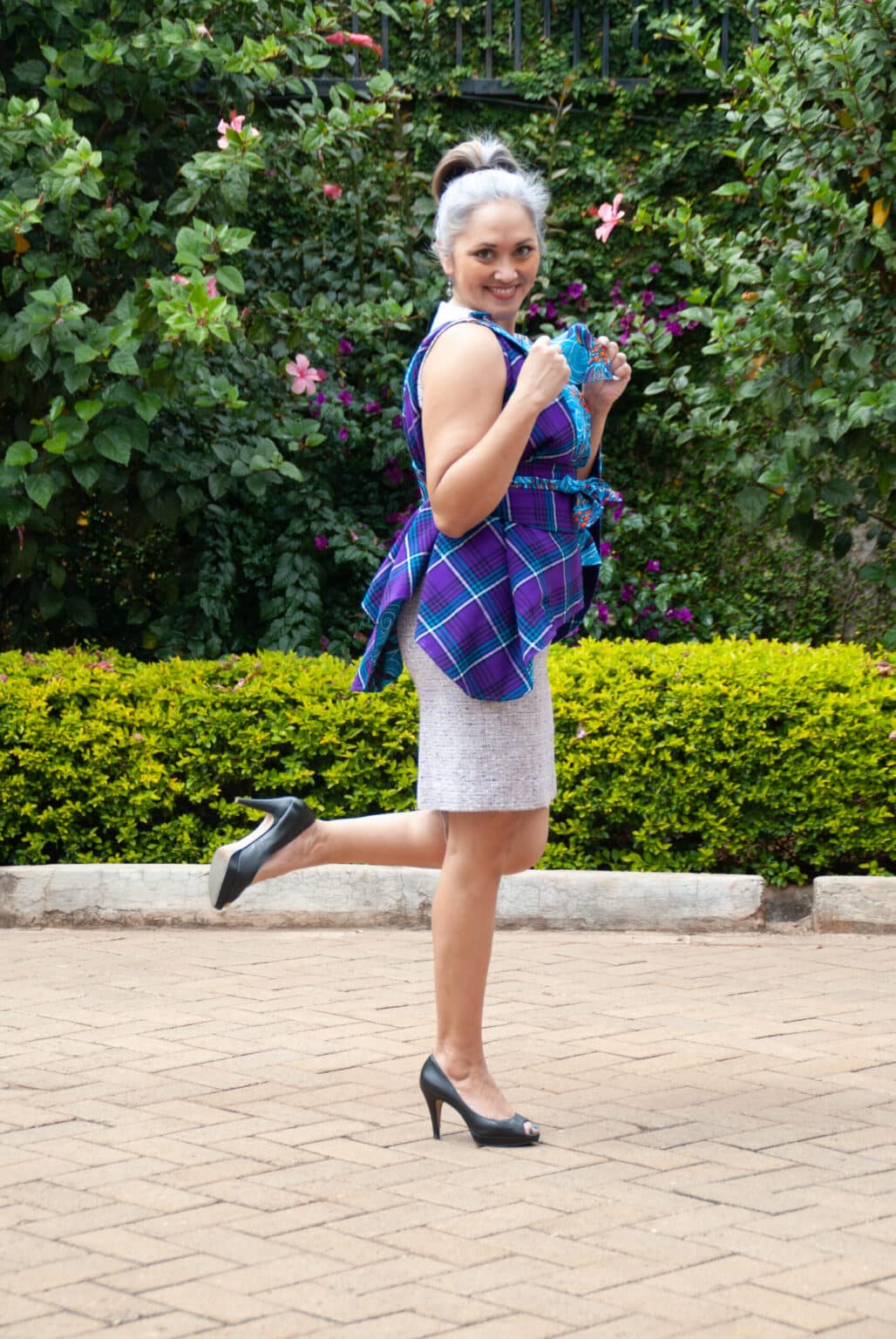 Happy Model with one leg up wearing Violet Blue Kapemono